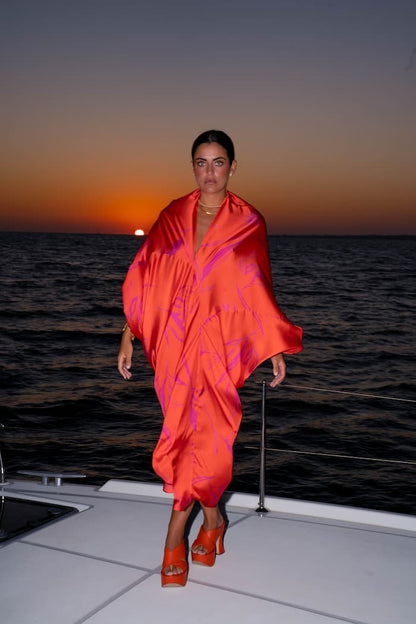 Vestido SHAIRA naranja con estampando en fucsia