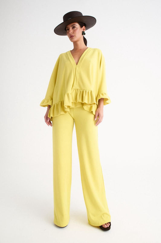 Pantalón recto en punto fluido amarillo