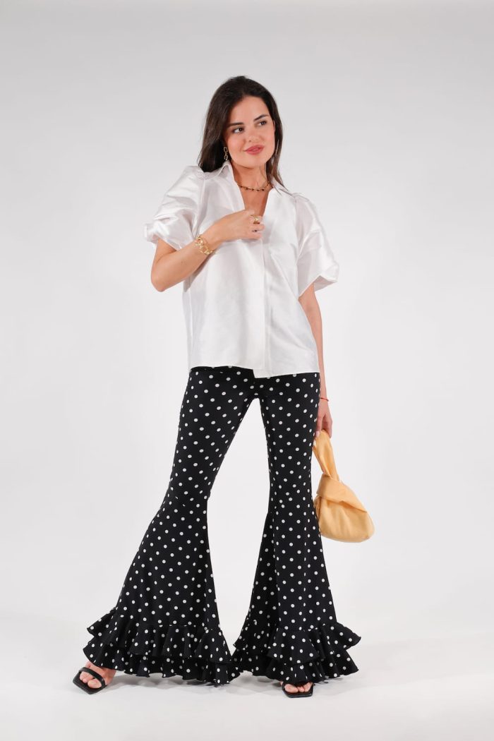 pantalon invitada de campana con volantes en el bajo